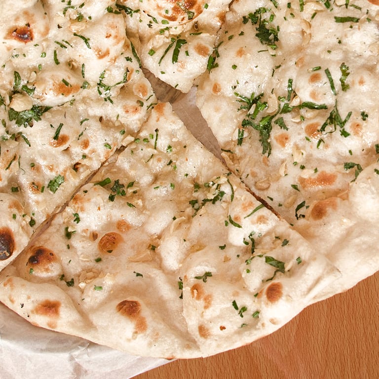 Freshly Baked Naan: Indian Delights